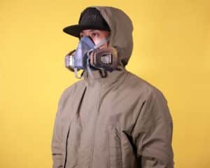 Jorge Majjul SEO Canada Colombia a men wearing gas mask or face mask amd hoodie with yellow background t20 kReGbE Smaller